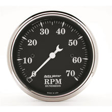Load image into Gallery viewer, AutoMeter 1798 Traditional incandescent lighting illuminates around the perimeter of the dial