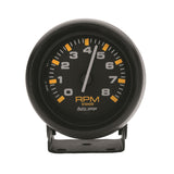 AutoMeter 2305 Traditional incandescent lighting illuminates around the perimeter of the dial