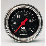 AutoMeter 2422 Traditional incandescent lighting illuminates around the perimeter of the dial