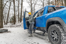 Load image into Gallery viewer, AMPamp-powerstep-xtreme-2022-ram-1500-trx-blue-winter-lifestyle-06.jpg