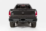 Fab Fours DR09-E2951-B Premium Rear Bumper; Uncoated/Paintable; w/Sensors; [AWSL];