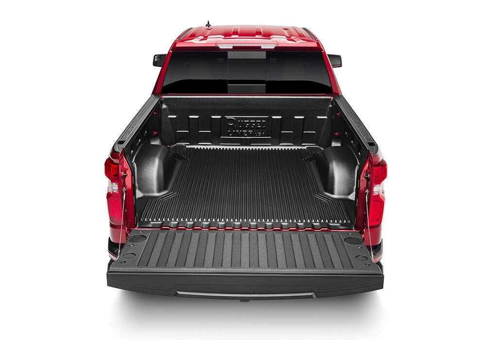 RL_DropInLiner_19Silverado_HeadOnRearOpenTail.jpg