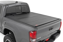 Load image into Gallery viewer, Hard Tri-Fold Flip Up Bed Cover | 6' Bed | Toyota Tacoma 2WD/4WD (2005-2015)