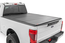 Load image into Gallery viewer, Hard Tri-Fold Flip Up Bed Cover | 6'10" Bed | Ford F-250/F-350 Super Duty (17-26)