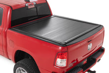 Load image into Gallery viewer, Powered Retractable Bed Cover | 5'7" Bed | Ram 1500 (19-26)/1500 TRX (21-24) 