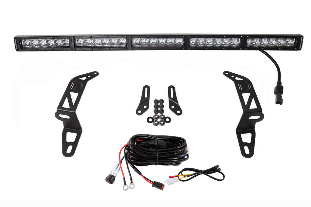 dd6077_jeep_jl_30_lightbar_bumper_kit_single_white_driving_2.jpg