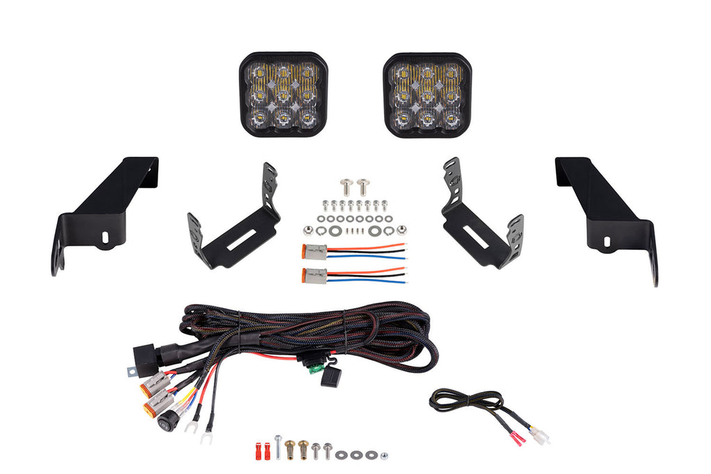 dd7280_jeep_jl_ss5_sport_bumper_kit_white_driving_1.jpg