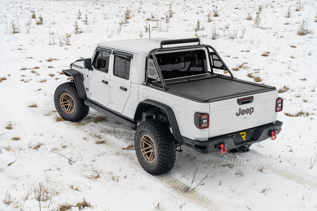 nfab-arc-sportbar-textured-black-2020-jeep-gladiator-white-snow-lifestyle-01.jpg